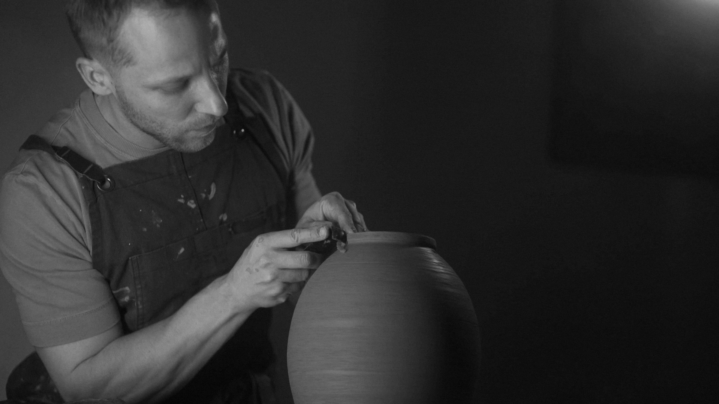 Klemen Trupej shaping a ceramic vessel in his atelier
